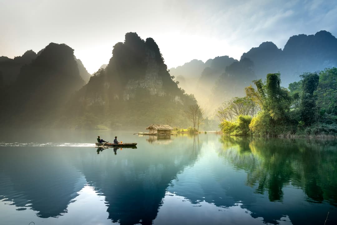 Prowall Free Wallpaper | Tranquil lake with mountains reflecting at sunrise in Tuyên Quang, Vietnam.
