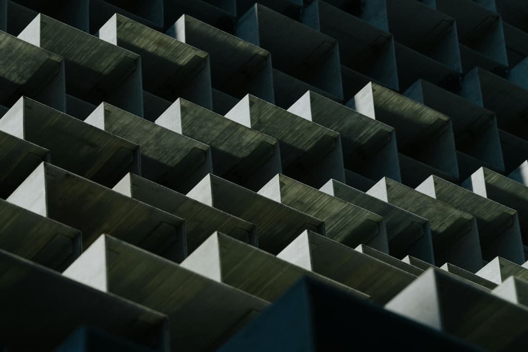 Prowall Free Wallpaper | Dynamic geometric pattern of an architectural facade in Toronto, showcasing modern design.