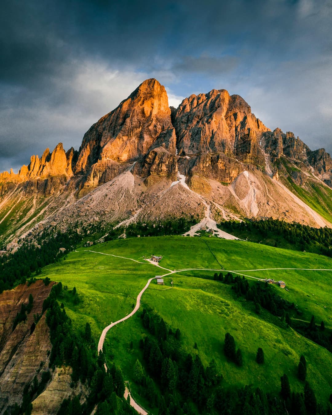 Prowall Free Wallpaper | Breathtaking aerial view of sunlit mountains and lush green valleys, perfect for nature enthusiasts.
