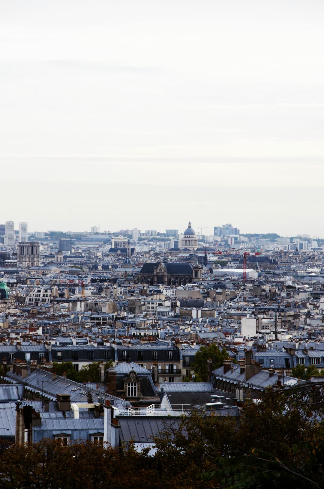Prowall Free Wallpaper | Stunning aerial view of Paris showcasing classic architecture and iconic landmarks.